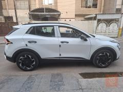 كيا سبورتج 2025 ابيض ثلجي للبيع في بغداد