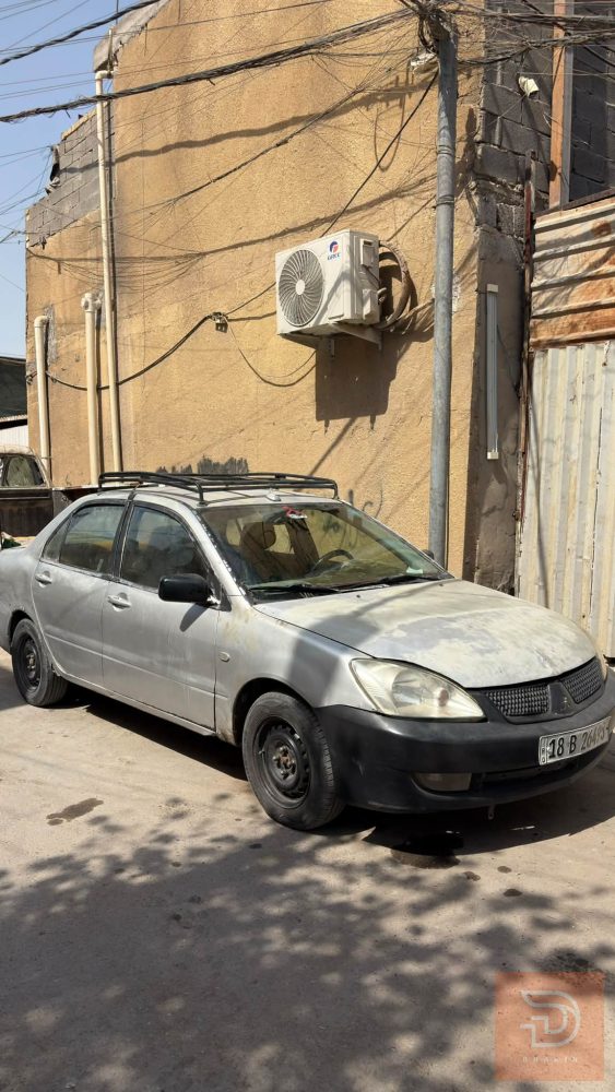لانسر 2004 للبيع في بغداد